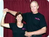 NQ Roc arms above shoulder pose